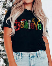 Load image into Gallery viewer, Black “BELIEVE” Christmas Tee